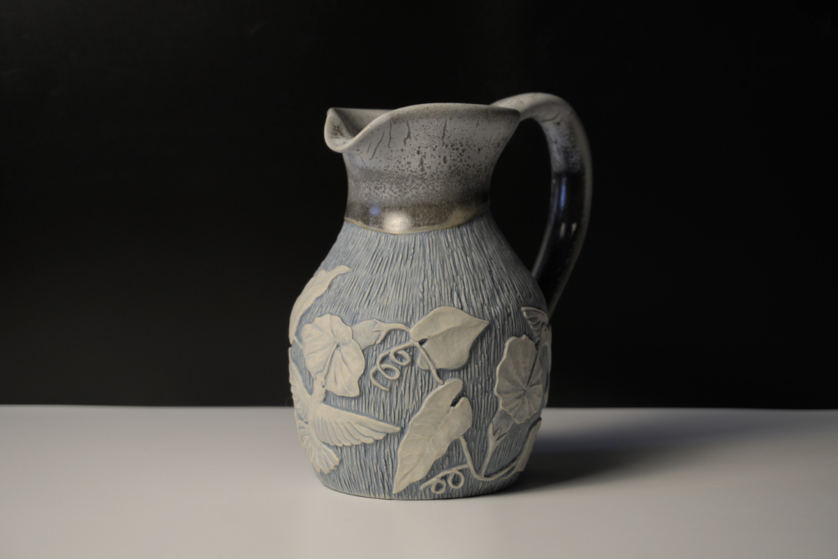 Unique pitcher with elegant carvings