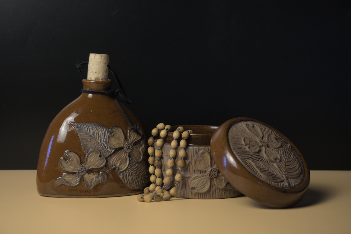Bottle and box with detailed carving