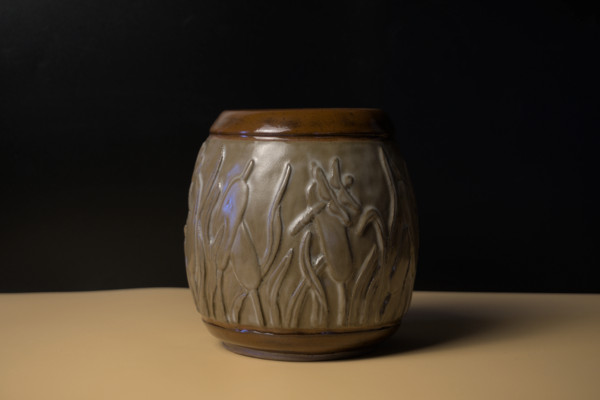 Vase with hand carved design