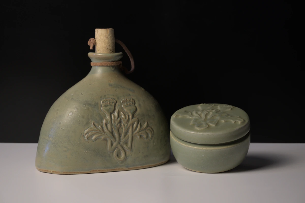 Bottle and box with detailed carving